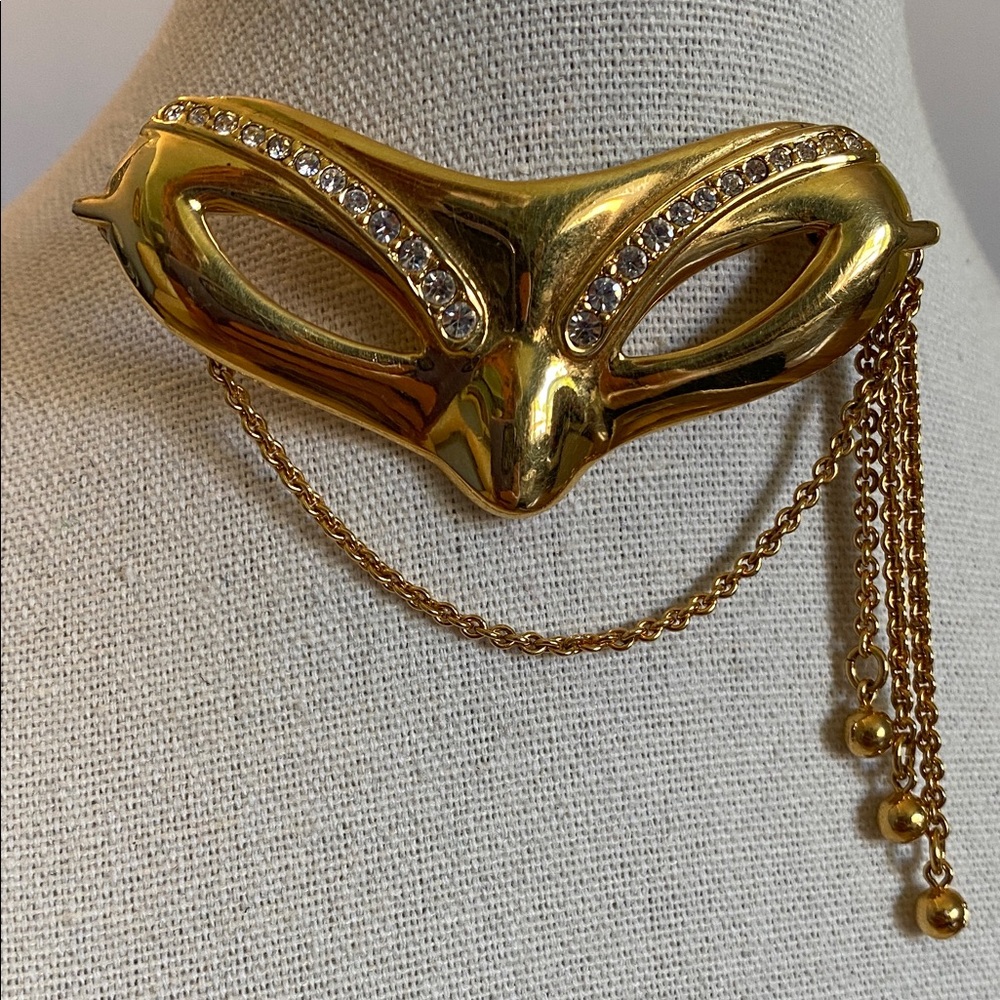 MONET Gold Mask Brooch with Chains